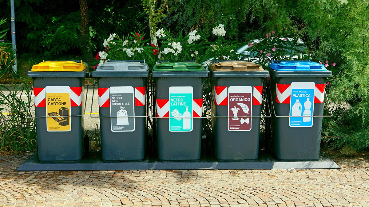 European municipal organic waste sorting bins including paper, plastic, and food waste collection.